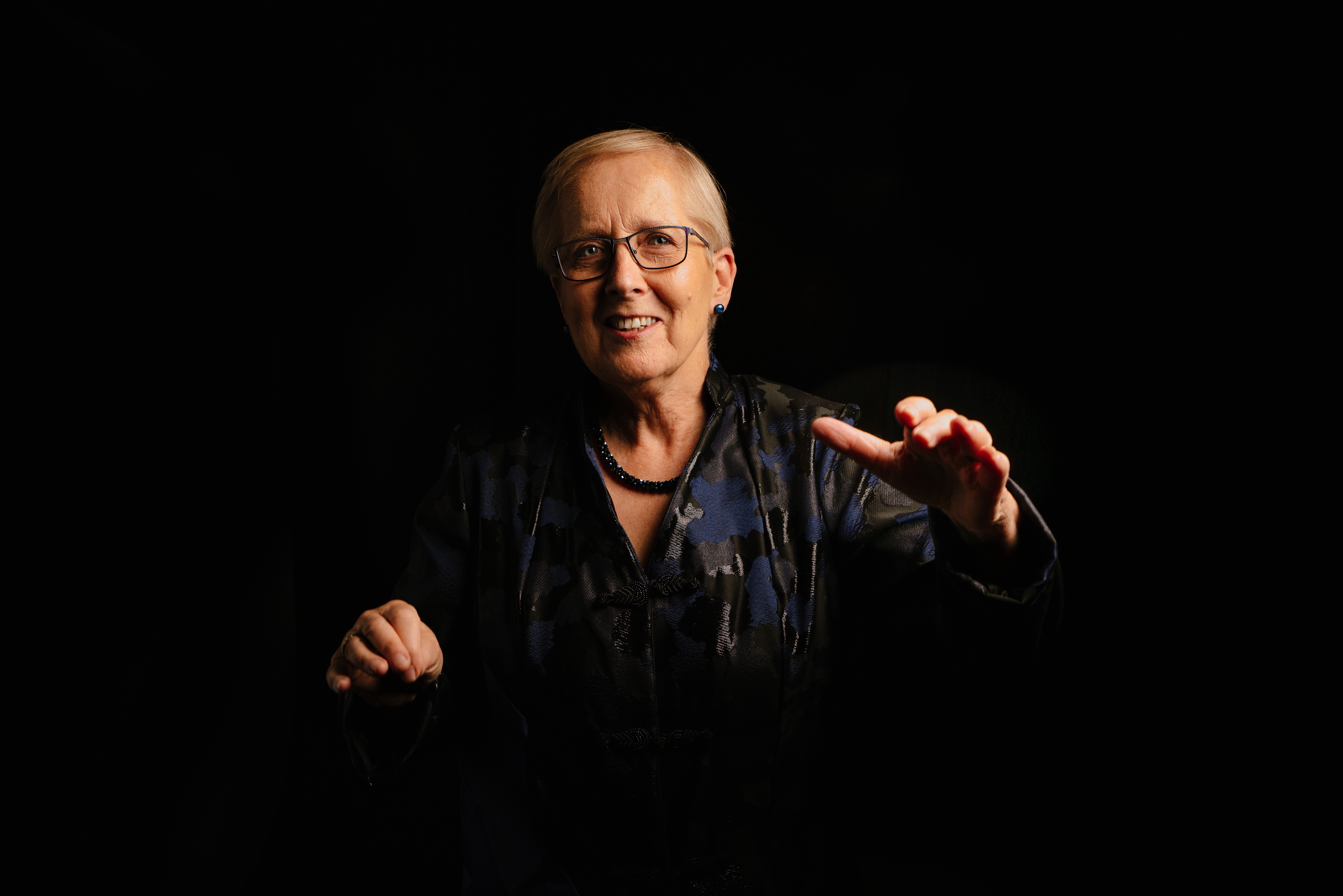 Karen   Grylls   Conductor  Dark Background Photo  Charles   Brooks